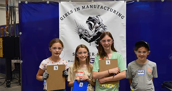 Four young girls at Girls in Manufacturing Summer Camp - cropped