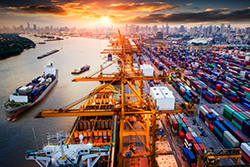 Logistics and transportation of Container Cargo ship and Cargo plane with working crane bridge in shipyard at sunrise, logistic import export and transport industry background - 250 x 167